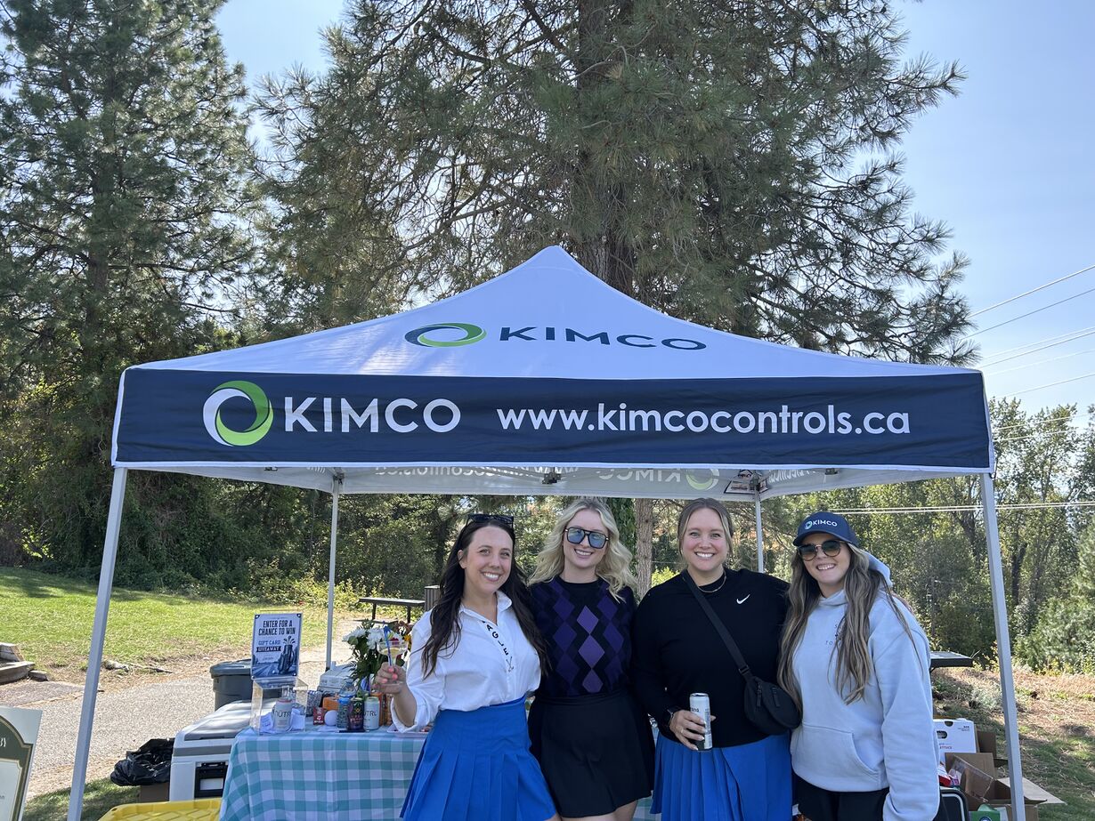 Kimco Controls team members having a ball at their tent during the SICA Golf Tournament