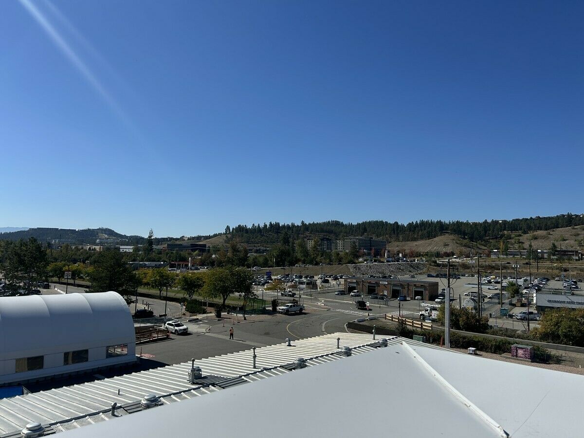 A rooftop view of the building's surroundings at Kelowna International Airport.